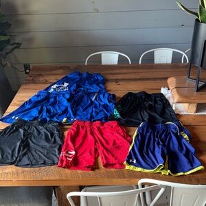Lot of medium under Armour boys shorts have been worn but a lot of life left!